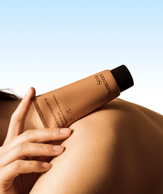 Daily Sheer Fluid SPF 50 in a styled setting