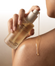 Dry Body Oil applied to skin
