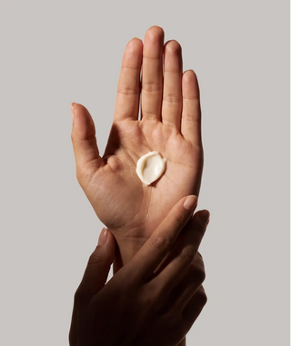A dollop of Hand Cream in an open palm