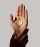 A dollop of Hand Cream in an open palm