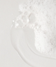 Primer plano de la textura de Mugwort Calming Mist