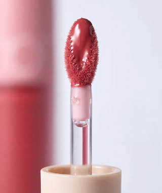 Tinted Lip Oil applied to lips