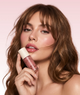 Model wearing Tinted Lip Oil